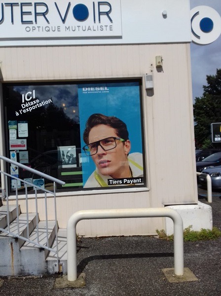 adhésif publicitaire vitrine opticien